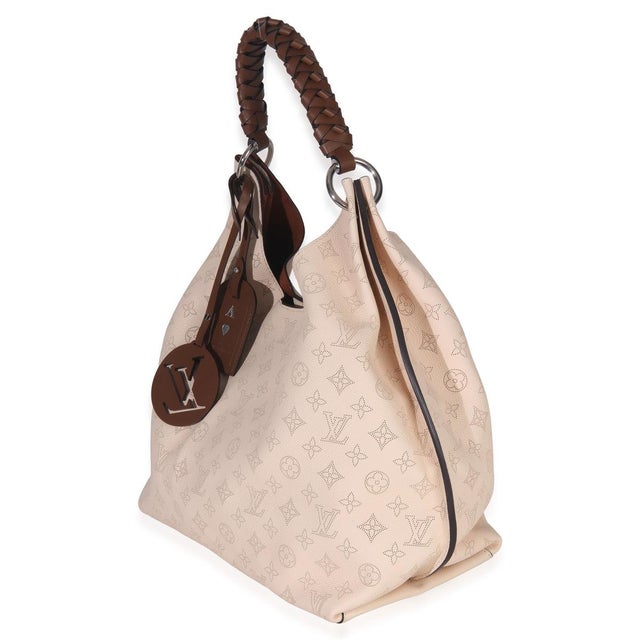 Item #: 152798 Interior Material: Microfiber MSRP: 5,350 Features Interior: One zip pocket. One slip pocket Dimensions:...
