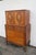 This classic Chest of Drawers is made out of wood, solid wood, mix wood, veneer, and brass. it was made by Johnson...