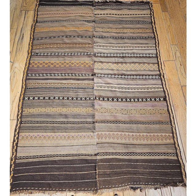 Immerse yourself in the rich textile traditions of Central Asia with this exceptional Early 1900s Vintage Uzbek Flat-Woven...