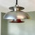 Large vintage mid-century modern pendant light from the 1970s, featuring an adjustable rise-and-fall mechanism that allows...