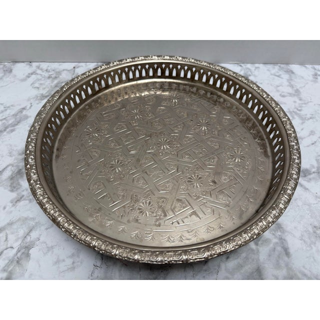 Vintage ornate engraved Moroccan silver tea tray. Etched geometric and floral pattern design with open weave perimeter and...