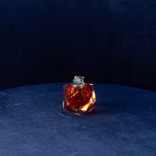Overview a jewel-like murano table lighter in faceted sommerso glass by alessandro mandruzzato, italy, 1970s. A submerged...