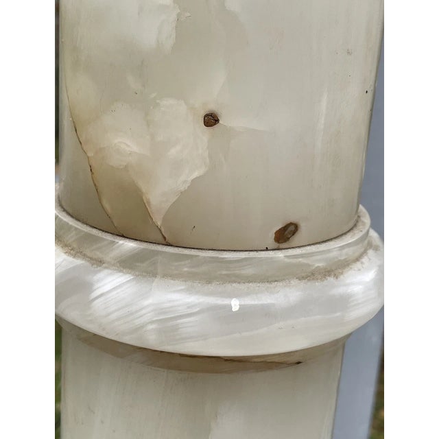 Welcome to Celestial Nonesuch For Sale Today: A gorgeous antique Alabaster stone carved pedestal. The square top freely...