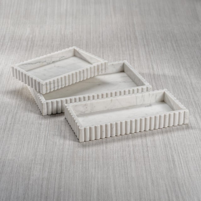 Indulge in pure luxury with our Camogli Scalloped Marble Tray. This elegant tray is perfect for displaying on a vanity,...