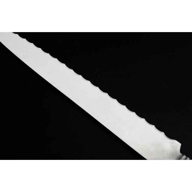 Georg Jensen, bread knife Old Danish. Bread knife in stainless steel and sterling silver with handle in the Old Danish...
