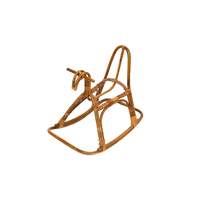 Bohemian rocking horse in rattan. Child's size. Great decorative piece for a room.