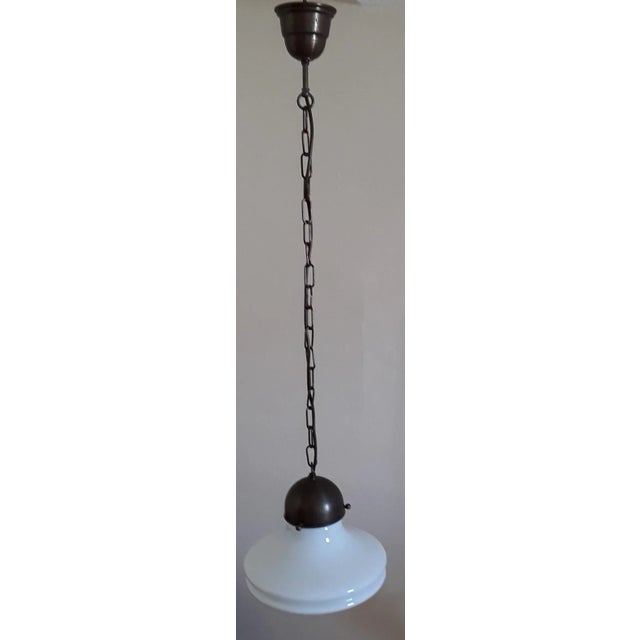 Vintage Pendant Lamp with Brass Assembly & Opaque White Glass Screen, 1970s, in Very Good conditions. Designed 1970 to...