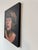 This oil painting on wood captures a moment of introspection, featuring a figure with closed eyes and a serene expression....