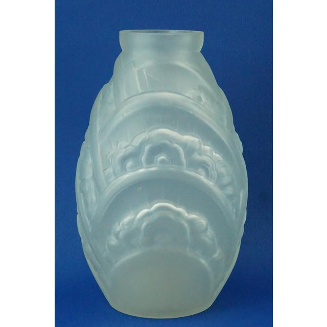 Item description: a stunning white glass vase, made opaque with acid treatment, decorated with bas-relief floral motifs in...