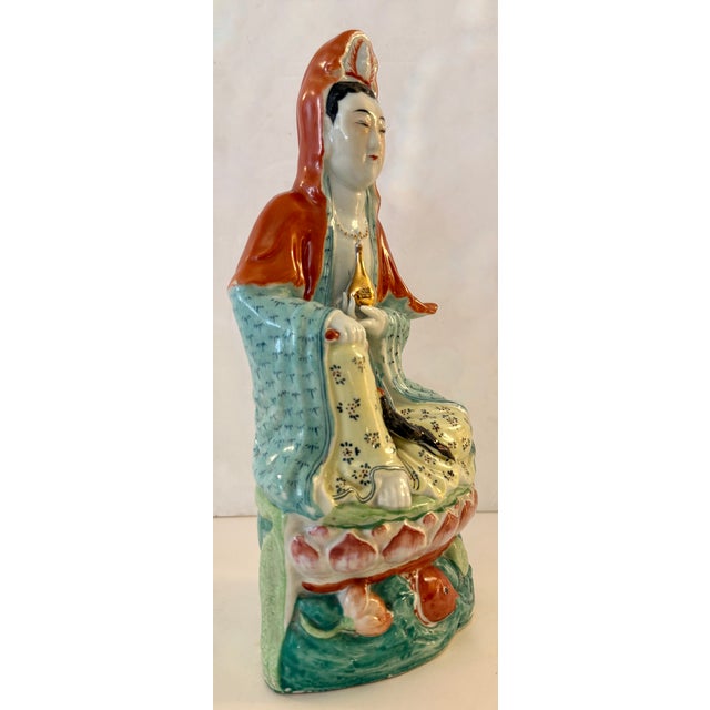 This is a vintage Chinese porcelain Guanyin statue from the 40's. The figure is Guanyin (also spelled Kuan Yin or Kwan...