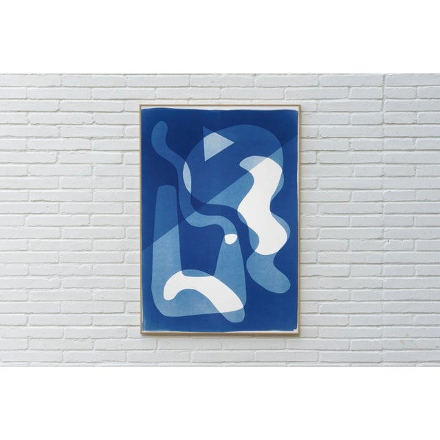 This is an exclusive handprinted unique cyanotype that takes its inspiration from the mid-century modern shapes. It's made...