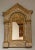 French 19th century mirror with columns, gilt trim and grapes.