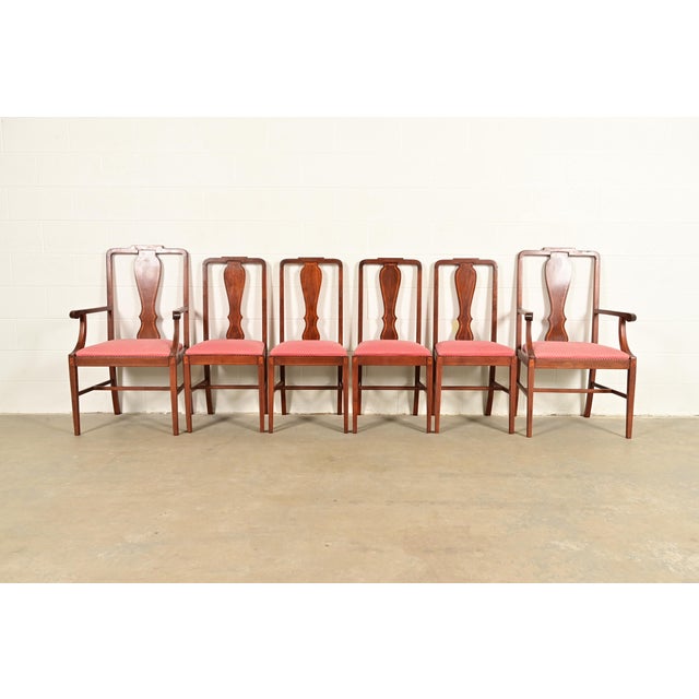 A gorgeous set of six Federal or Hepplewhite style dining chairs In the manner of Baker Furniture USA, Circa 1940s Carved...