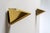 Elegant and rare pair of brass wall sconces by Jean Perzel. Designed and crafted in France, these timeless pieces embody...