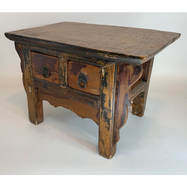 Beautiful Chinese small two drawer stand. Makes a great plant stand or just a charming side table. Circa 1920s