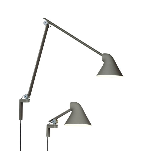 Oki Sato NJP gray long wall light for Louis Poulsen. Designed by Oki Sato from Japan's Nendo design studio. Provides...