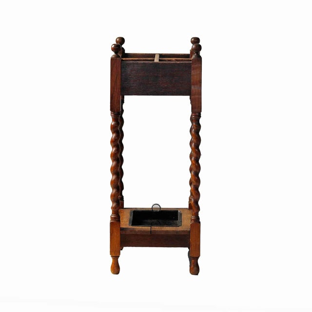 Antique barley twist umbrella and stick stand, dating from the late 19th century to the early 20th century (Victorian or...