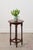 This antique English round oak side table features a circular top with a scalloped edge and barley twist legs connected by...