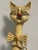 Whimsical oversized seated cat sculpture by Jeanne Valentine, handmade in Mexico from papier-mâché. The piece features an...