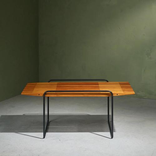 The coffee table designed by Taichiro Nakai and crafted by La Permanente Mobili Cantù. Made in a duo tone wood of Cherry...