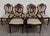 This is a stunning complete set of six vintage Hepplewhite or Georgian style shield back dining chairs, including two arm...