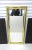 A gold '70s Modern Disco style full length wall or floor mirror, Postmodern period, 1985, USA. Mirror has a gold 'Disco'...