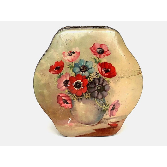 Vintage biscuit tin box with a hinged lid has a lovely floral design and lots of shabby chic character. Made circa 1910s -...