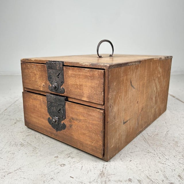 Kake-suzuri (懸硯) is a storage cabinet for valuable documents and writing tools (calligraphy). This simple piece features...