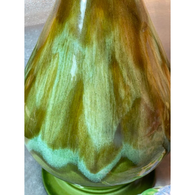 This 1960s MCM Royal Haeger Etruscan Blue Green Lava Drip Glazed Ceramic Lamp is a vintage table lamp featuring a medium...