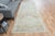 Vintage Hand-Knotted runner rug is a semi-antique vintage area rug. The '70s Eastern region of Anatolia's unique rug is...