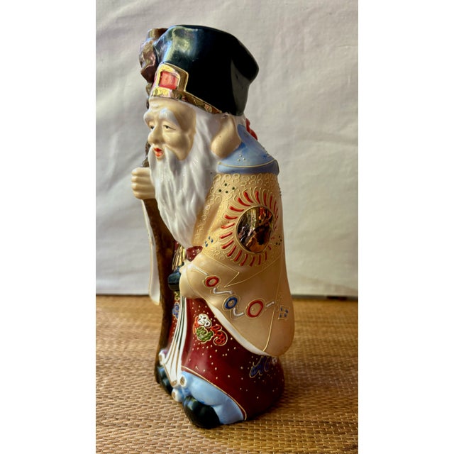 Mid 20th Century Pair of Vintage Porcelain Kamotsuru Sake Bottles Depicting the Gods of Longevity and Wealth For Sale - Image 5 of 12