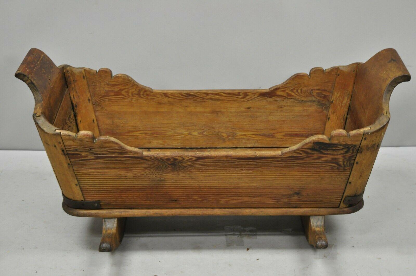 primitive antique wooden baby cradle