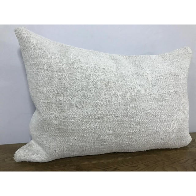 This is a vintage Turkish Anatolian kilim rug from the 1960s. The piece was hand-woven. Just cover no insert