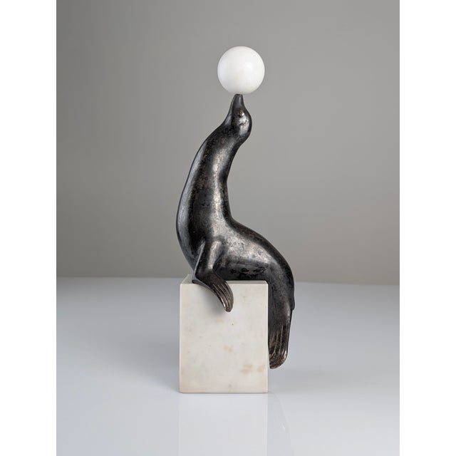 Marcel-André Bouraine, Sealion Sculpture, 1920s, Metal on Marble Base, in Good conditions. Designed 1920 to 1949 This...