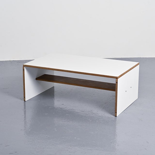 Designed by Pierre Guariche, this ingenious table can be used as either a coffee table or a desk. It consists of two...
