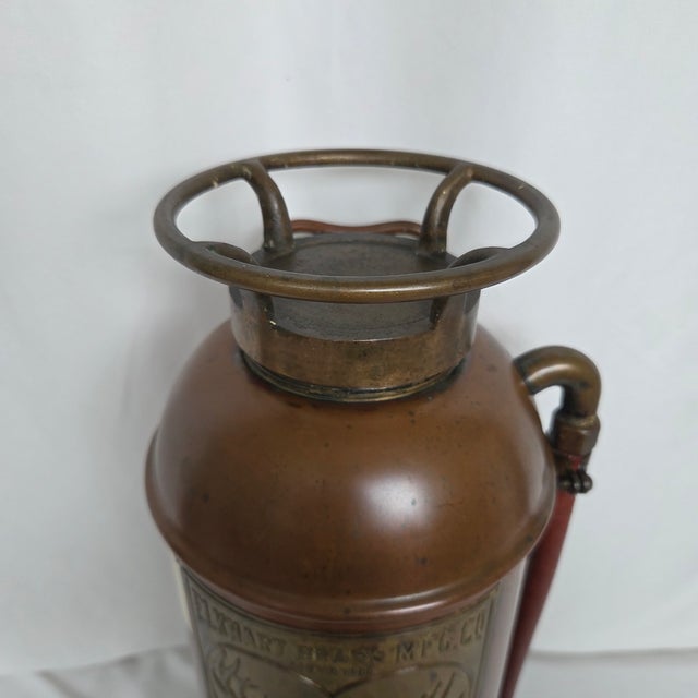 Substantial vintage Elkhart Brass Manufacturing Co. 2½-gallon soda-acid fire extinguisher constructed with a copper tank,...