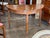 French walnut and 19th century, with a half round top over a plain apron on three square tapered legs. The top has the...
