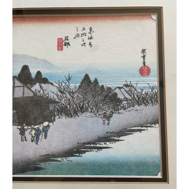 The Ishibe Megawa Village Sato Utagawa Hiroshige Wood Framed Vintage Block Print is a unique and authentic collectible...