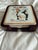 A wonderful set of ceramic coasters featuring The Saturday Evening Post covers by Norman Rockwell. Each of the coasters...