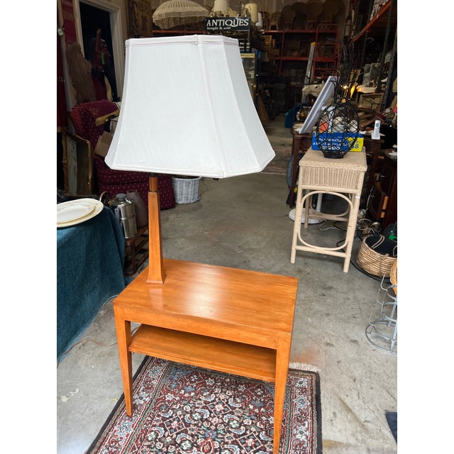Up for consideration is a beautiful vintage mid century modern wooden table with lamp. This would look lovely in your home...