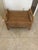 Great vintage-style wicker or rattan footstool featuring a rectangular woven top and curved side handles. This type of...