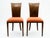 Pair of coconut shell chairs with curved backs and mother-of-pearl inlay detail at top. Paris, France, circa 1990s.