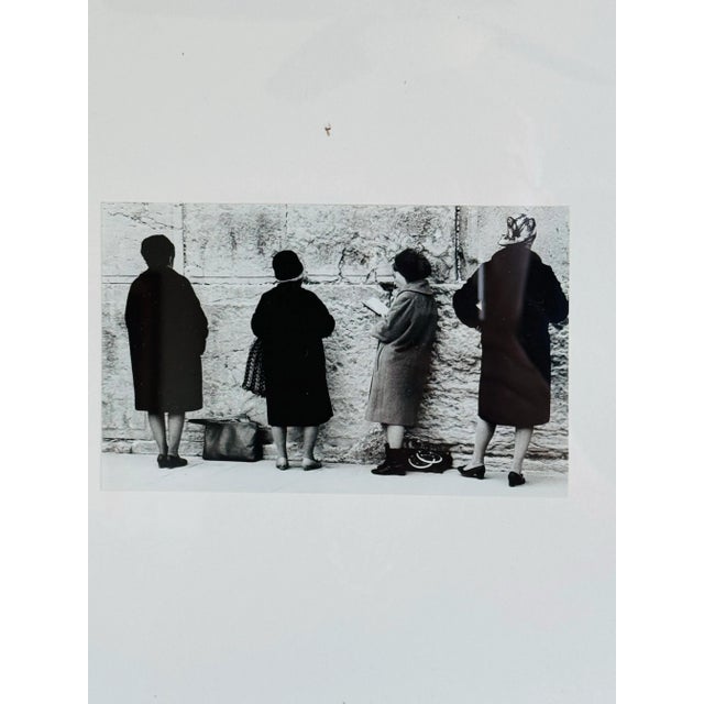 Vintage 1968 photo “Western Wall” Jerusalem by Irene shwachman. Framed in a black metal frame with a white matte. Depicts...
