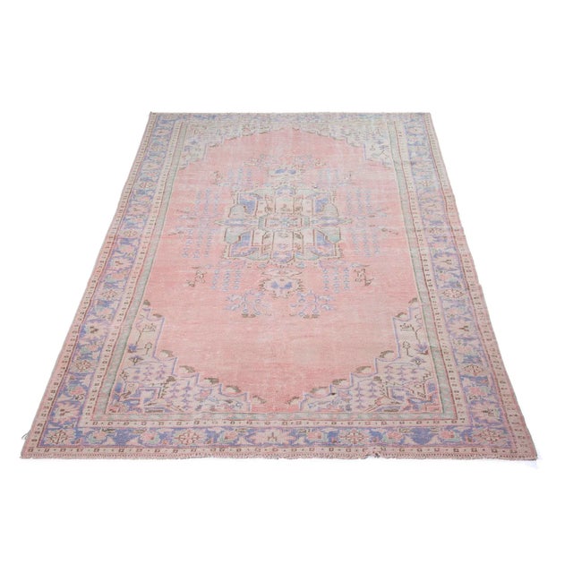 Vintage hand-knotted rug from the Oushak region of Turkey. Approximately 50-60 years old. In very good condition.