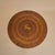 A 19th Century Italian Neoclassical center table, crafted in rich walnut and adorned with exquisite marquetry. The round...