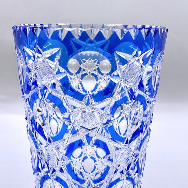 A vintage British Art Deco luxury, this heavy "Constellation" trumpet vase was designed by the legendary Stevens &...