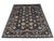 This Afghan Sultani wool area rug features a deep navy blue field filled with Persian-inspired floral and botanical...