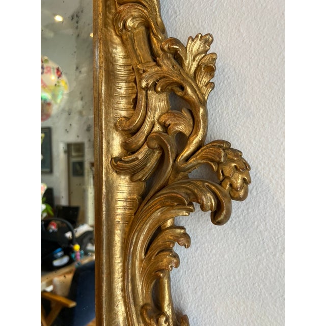 Wood Mid-Century Italian Rococo Revival Giltwood Mirror With Elaborate Foliate Crest For Sale - Image 7 of 15