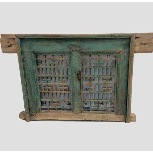 Antique green Chinese wood screen panel window is in the same condition as it was found. Original wood and color. Its...