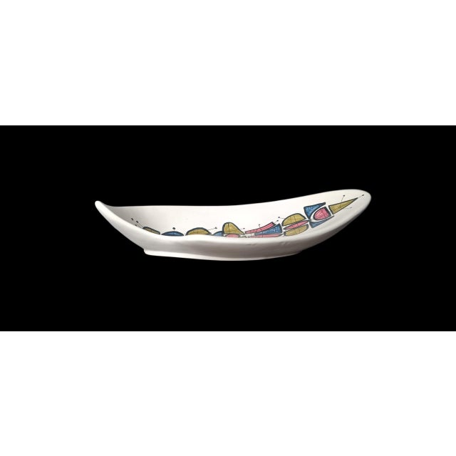 Roger Capron (1922-2006) in Vallauris, large free-form bowl with stylized polychrome decoration. This piece has an...